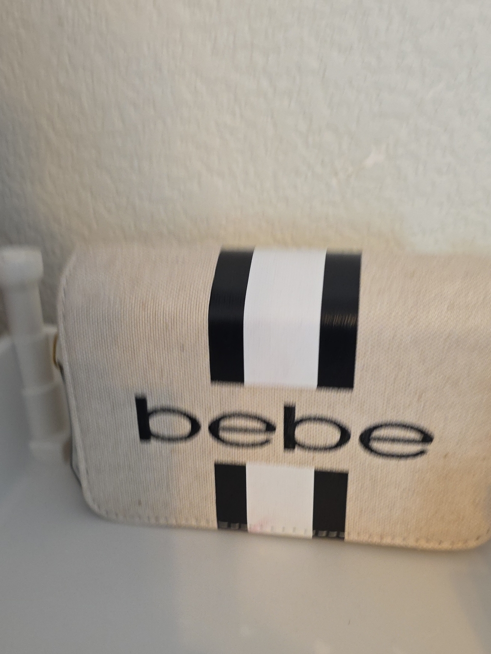 bebe Cream and Black Striped Cosmetic Case